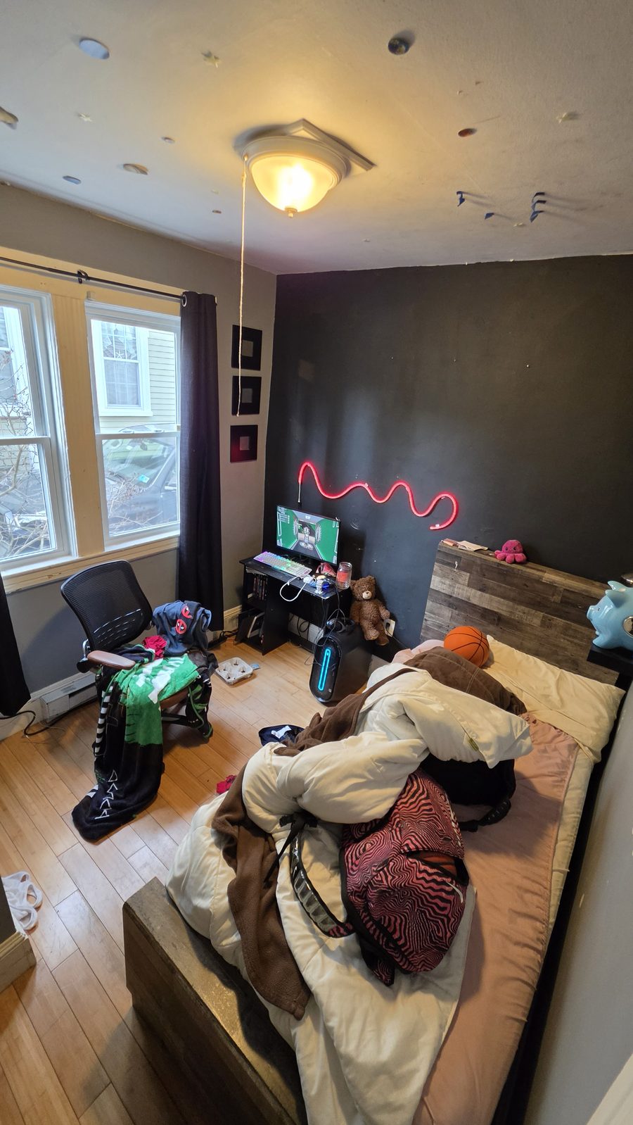 A bedroom before a Host Cleaning Services deep clean, cluttered and untidy